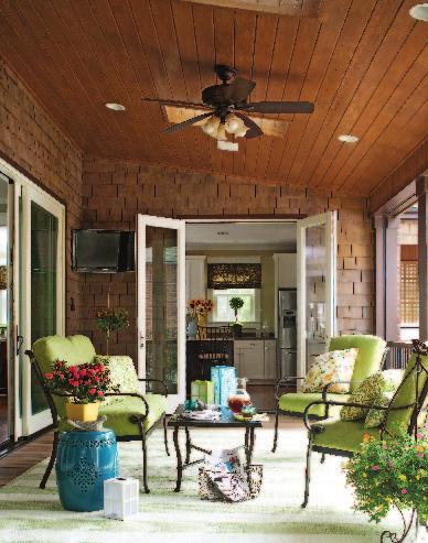 What... This Photo Enclosed on three sides, the new porch folds into the new portions of the home. Fabrics here complement the adjacent family room to visually connect the two spaces.