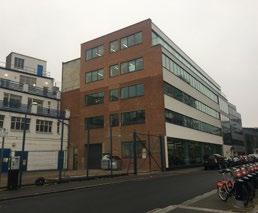 It is located in a commercial area containing a mix of large office, town centre and small business.