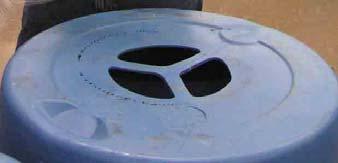 Lid: Be Creative. Used barrels vary greatly, so you may have to improvise. Example A: Barrel with lid. Use a jigsaw to cut a hole in the lid the size of the inside of the atrium grate rim.