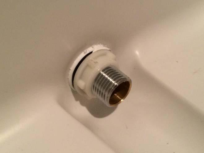 4) Inside the cooler, thread on the nut that you removed from the washing machine valve.