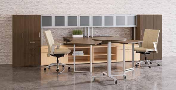 Specify units in tandem using modular components. (Bullet corner desks shown with Stardust Silver column base, frosted acrylic trim modesty panel, storage cabinets and Tyler seating.