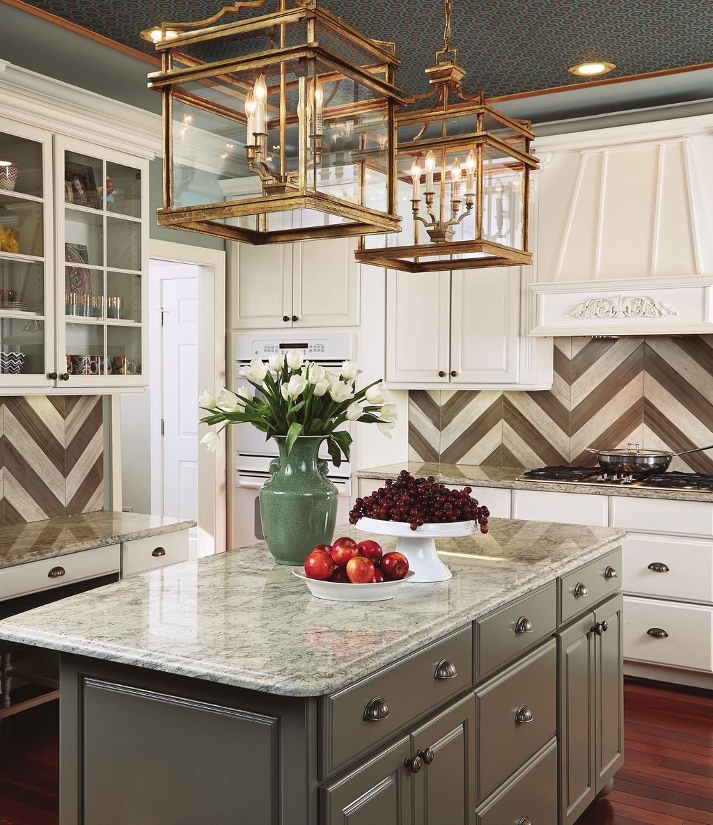The kitchen s cabinetry and countertops were retained, but the chevron backsplash (which echoes the pattern of the flame-stitch fabric in the great room) was added, as was the ceiling