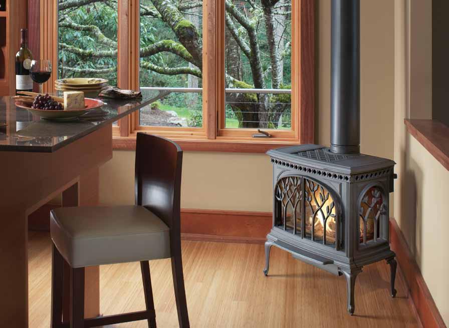 Tree of Life Gas Stove Shown in the Black Painted Finish Inspired by the Gothic arches of cathedrals in Europe and a love of nature, the Tree of Life s delicate branch and leaf design is as