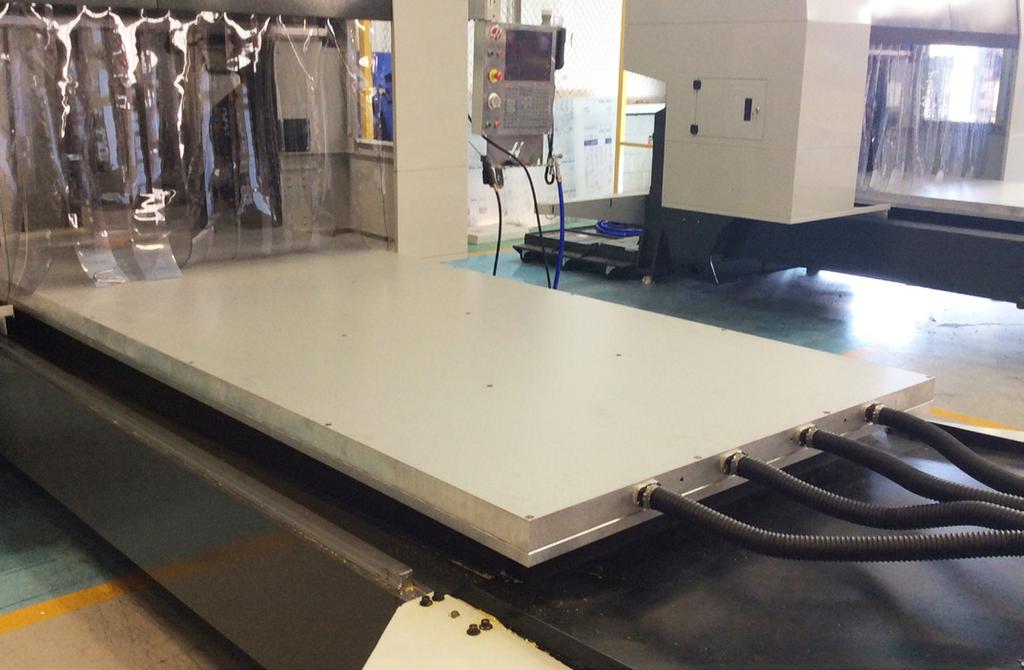 Vacuum Tables Hold Precision workholding and greater production efficiency mean increased profits are in the air By Michael Hurley Graphic Parts International, Inc.
