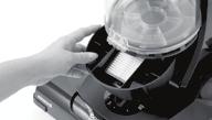 To access the pre-motor filter, remove the Easy Empty dirt tank from the vacuum base and push the lid release button located on the carry handle. Remove the foam filter from the filter tray. 3.