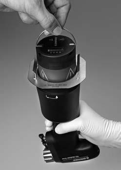 Press firmly onto the power module to ensure that it is correctly seated in the handpiece (Fig. 4).