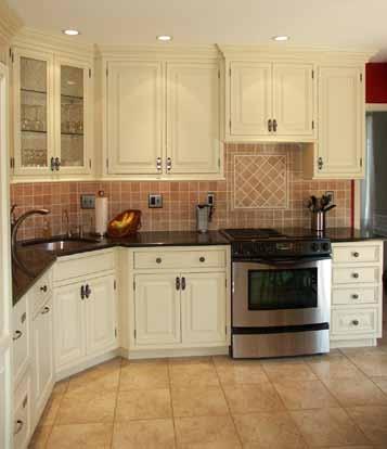 Elegant Upgrade With dark wood cabinets, laminate countertops and wallpaper everywhere, this kitchen was rooted in the
