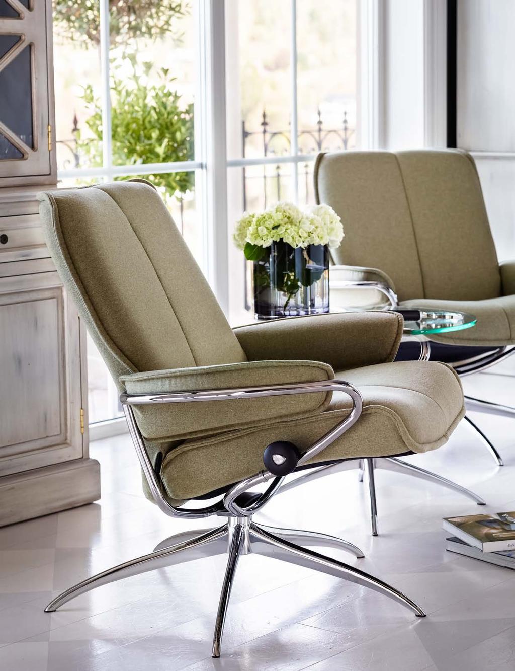 16/17 Stressless City Low Back recliners shown in fabric Calido Light Green.