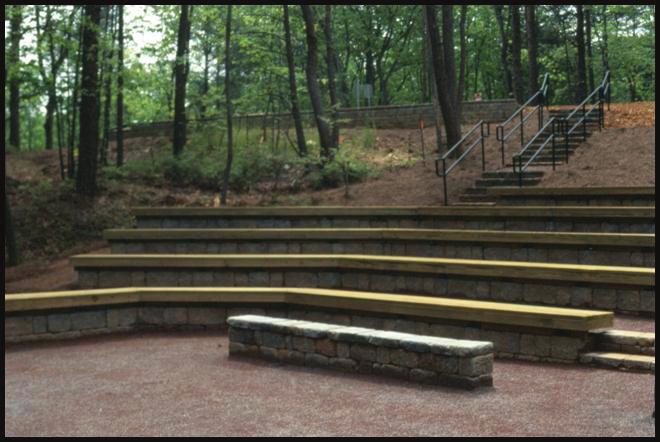 It will substitute as a As part of the Folds House exterior improvements, an Outdoor Classroom will be situated on the woodland slope with stone seatwalls and a stage.