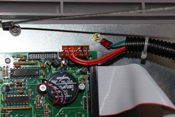 Alarm Installation Wiring the Alarm Front Panel to the Power Supply Attach the green ground wire, which is in the