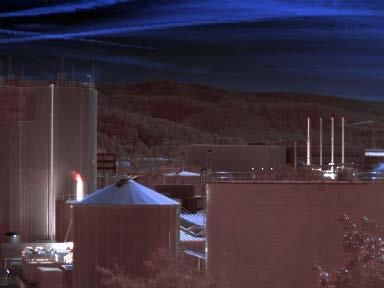 5. imaging Fig. 7 shows a bispectral IR image of an industrial area, where the blue and red channels have been superimposed in blue and red color scales, respectively.