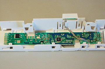 PCB: Release marked locks and remove PCB from the PCB carrier.