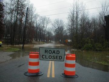 Do not walk through flowing water or drive through heavily flooded areas. If you can safely do so: Secure equipment, records, and any valuable items. Move to safer ground.