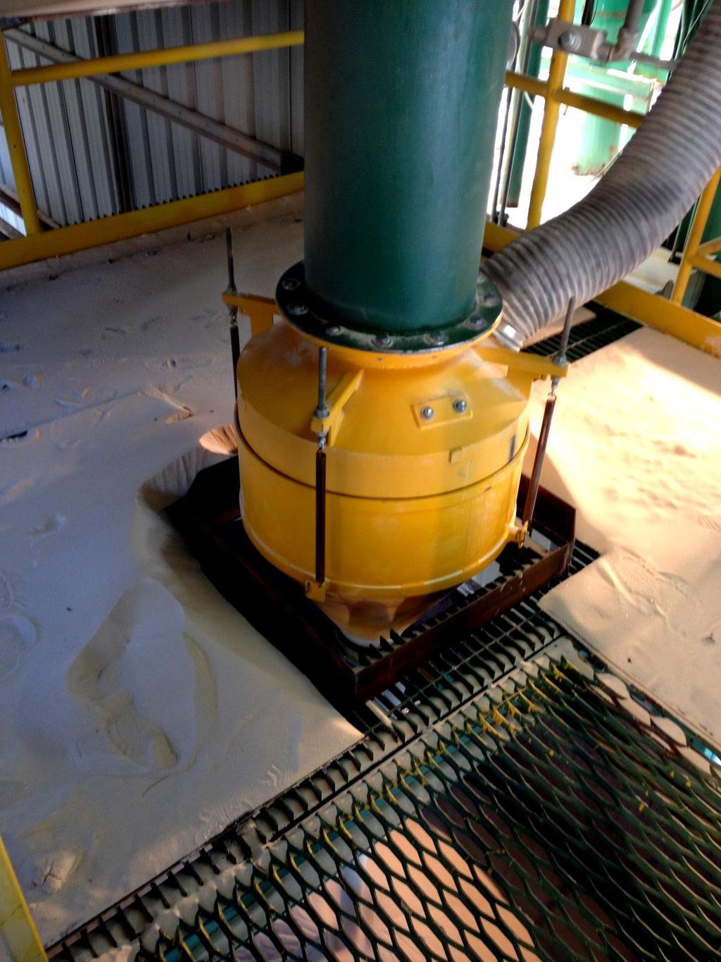 A DSH-MINI Tardis system installed on a vertical feed pipe for a silica sand unload application.