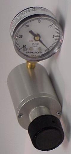 Knob rotates clockwise to increase vacuum level. Regulates from 0 to 20 Hg. Flow range up to 70 liters per minute. Available with optional gauge (shown).