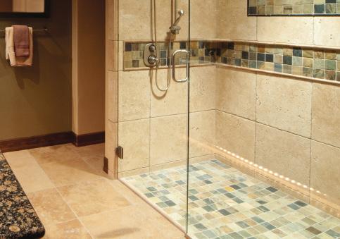 areas with allowance for the shower drain.