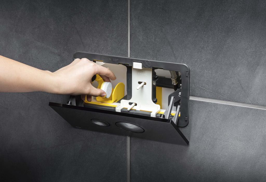 Viega pre-wall technology 13 Viega tablet holder The hygienic and concealed solution: with the new tablet holder behind the flush plate, WC cleaning tabs can easily be used in the concealed cistern