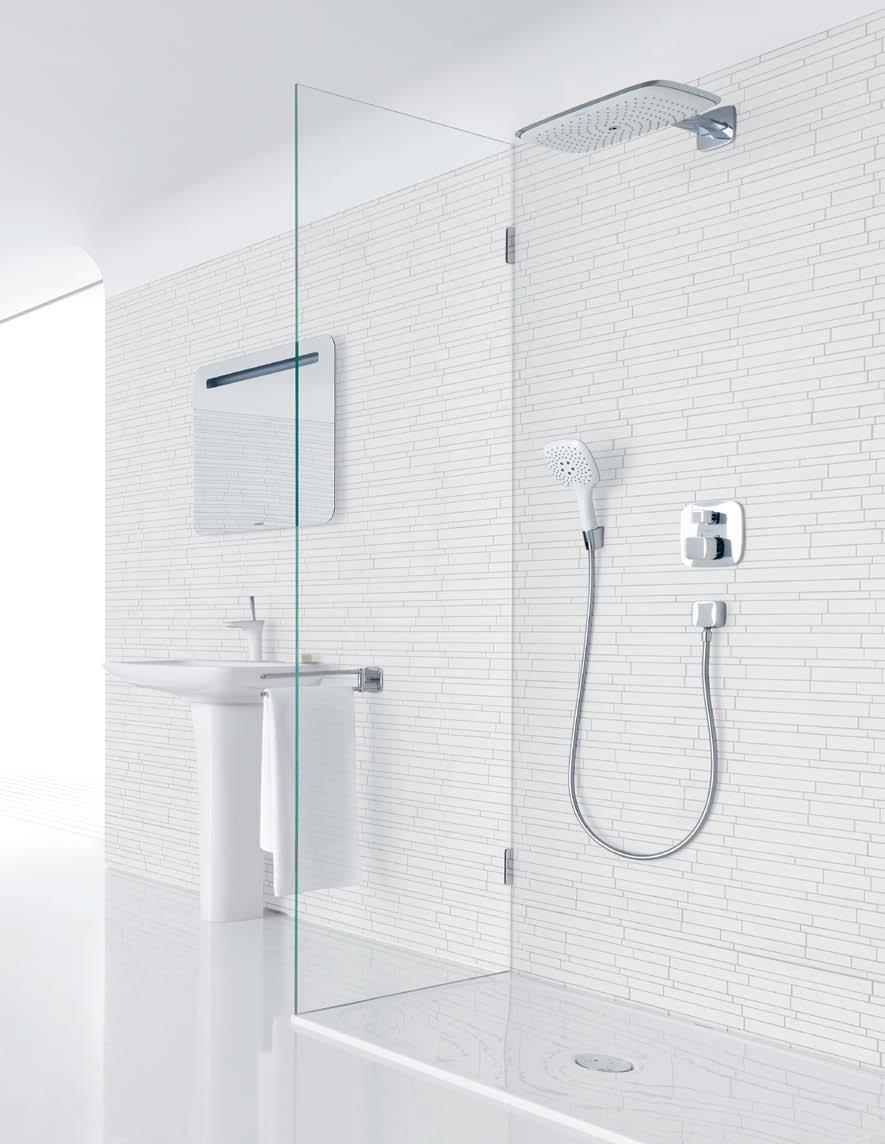 An oversized PuraVida 400 AIR showerhead and thermostatic trim with volume control and diverter complete this exhilarating shower installation.