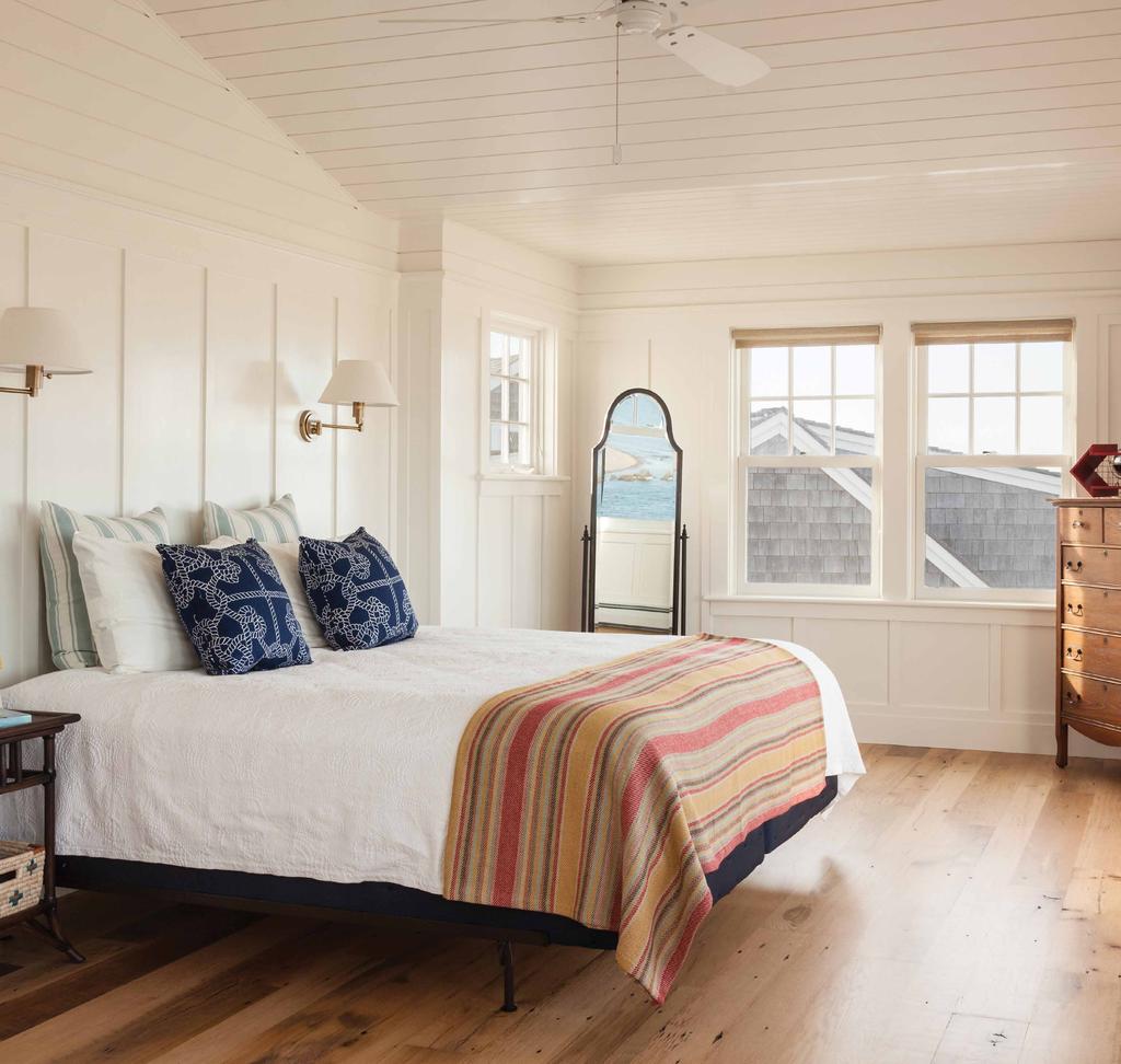 Making the most of every inch, a window seat in the master bedroom offers extra seating and spectacular views.
