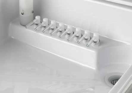 Right-angled basin connectors (shown in this figure) should be inserted in any basin channel port that are not being used.