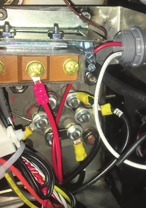 23. Connect the red wire from the solenoid coil to the NORM OPEN lug on the thermostat. 24.