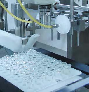 An optional capping turret applies ROPP, snap-on, screw type, or tamper proof caps onto bottles.