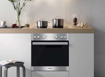 The cooktop is operated via controls on the oven's fascia panel via a built-in wired connection.