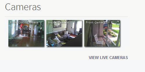 One of the cameras is displayed as live video. The other camera views (not live video) are arrayed over it.. Click an image above the video to view live video from each camera.