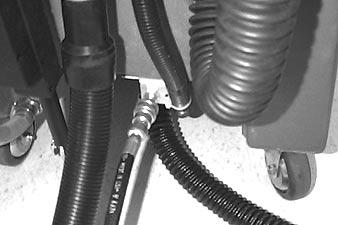 Connect solution hose to accessory tool coupler, located at lower rear of machine (Figure 11). FIG.