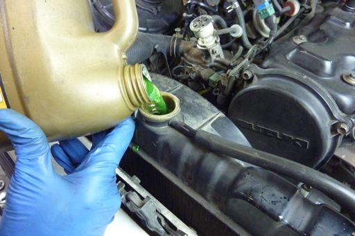 Hot coolant can belch out unexpectedly.