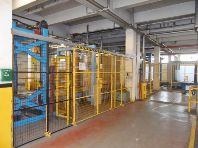 Pallet shrink wrap Actipac in line pallet wrapper, plastic wrap with gas heated heat tunnel.