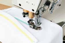 It comes with a left hand fabric trimmer for trimming fabric in parallel, at all times, to the seam with consistency.