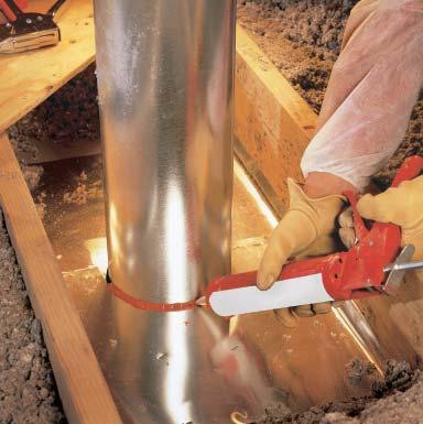 Because the pipe gets hot, building codes usually require 1 inch of clearance from metal flues (2 inches from masonry chimneys) to any combustible material, including insulation.