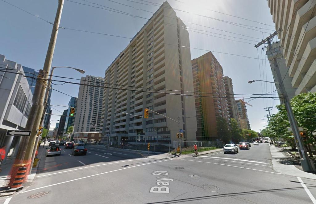 Immediately south across Slater Street is a 21-storey apartment building at