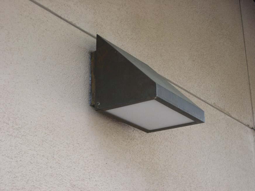 Wall Light: Wedge Down Shaper Floating Wedge Wall Sconce Downlight This is one of our standard options for exterior-mounted wall lights on campus.