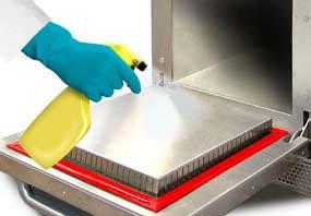 Use a dry clean brush to remove any food particles from between the oven floor and the inside of the front door. 4.