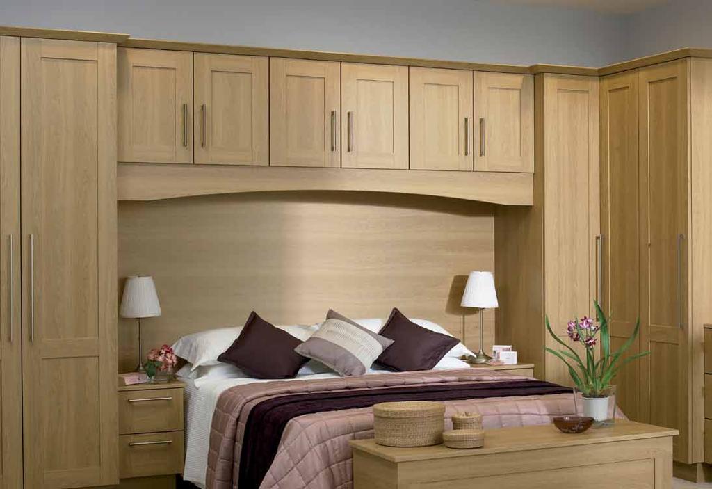 Classic St James Classic oak effect shaker shown here with convenient storage cupboards