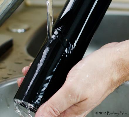 Step 5) And rinse the dust fines from the exterior of the Black Berkey purification