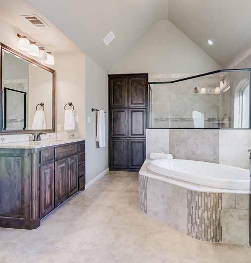 tub surround & ceiling Deco tile allowance for tub area Corner tile shelves MASTER ALSO INCLUDES Concrete/tiled bench in shower