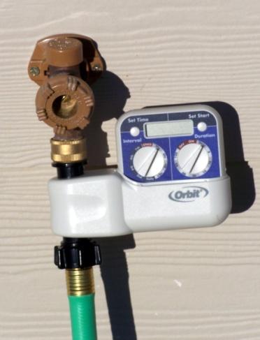 Houseplant watering meters are helpful in evaluating the soil moisture content under mulch. Realize however, that these inexpensive meters are somewhat inaccurate.