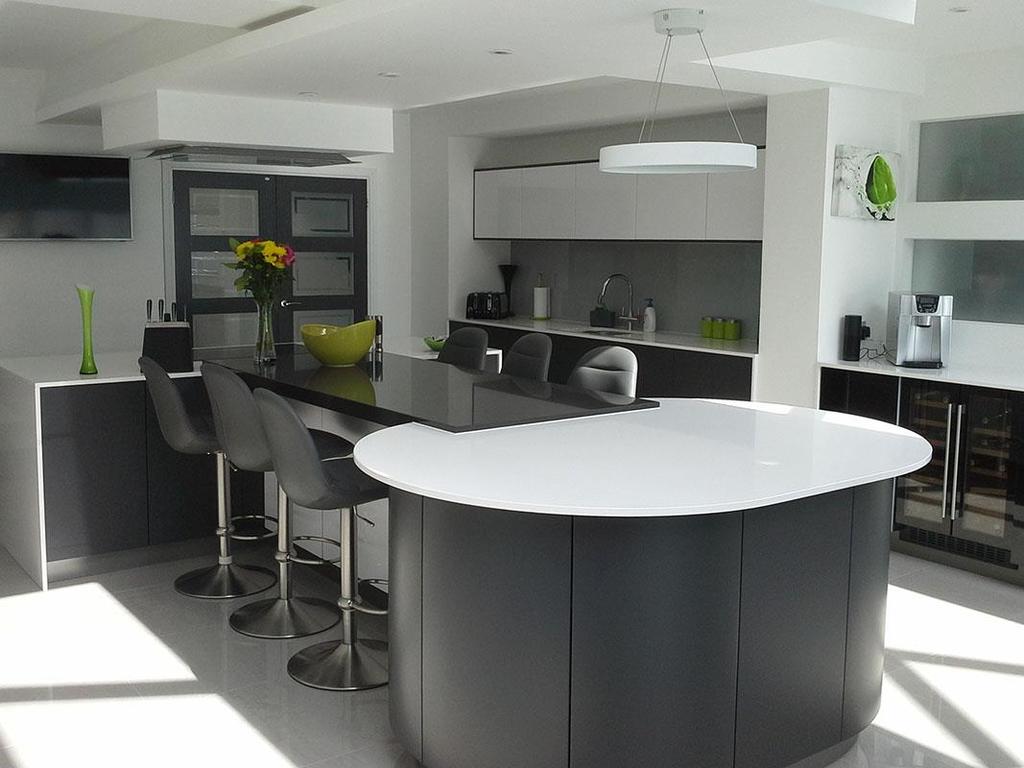 Pronorm High Gloss Lacquer in White and Matt in Stratus Grey Handleless Kitchen with Push to Open System. Rugby.