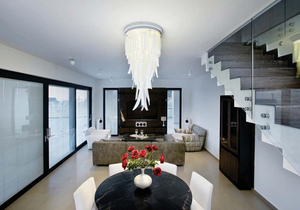 Light waterfall Drama is the goal of these fixtures, with their lightening shaped glass pieces aiming their energy toward the ground, they fill their space with action and