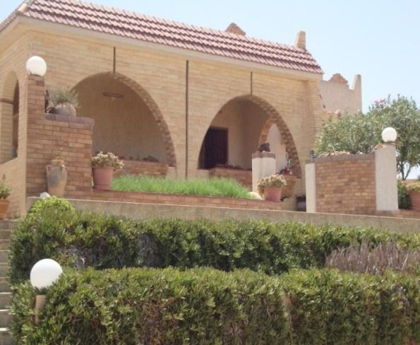 can be found in a contemporary house in Tripoli, with the same utility rooms and the same structure. It is surrounded by external gardens and a fence for protection.