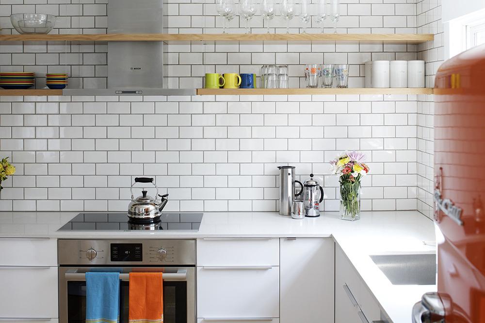 The addition of classic white subway tiles as a backsplash create the
