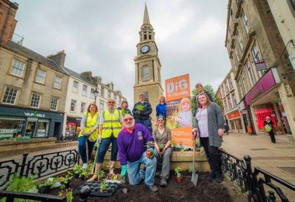 Alloa in Bloom (Business Improvement District) Clackmannanshire The Alloa BID contributes to a very buoyant and lively town centre, with numerous planters, hanging baskets and various planting