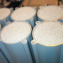 This design allows the desiccant material to be retained within the drying chambers.