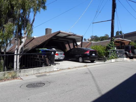The Boathouse Thematic Group is a non-contiguous grouping of twelve identical single-family residences occupying steep hillside lots above the Cahuenga Pass.