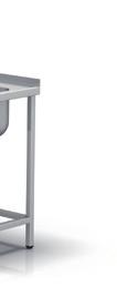 in front under table top, height 250 mm cabinet base mounted on 140 mm adjustable legs table with one bay with