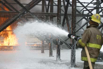 Figure 6: Manual Discharge of Low-Expansion Foam Through a Hose Line. Photo Credit: Kidde Fire Fighting - National Foam The systems may be manually or automatically operated.