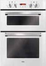 Double ovens dc940 Built-in electric double oven top oven lower oven Black easy clean enamel interior Interior halogen lights Cooling fan Chromed rack